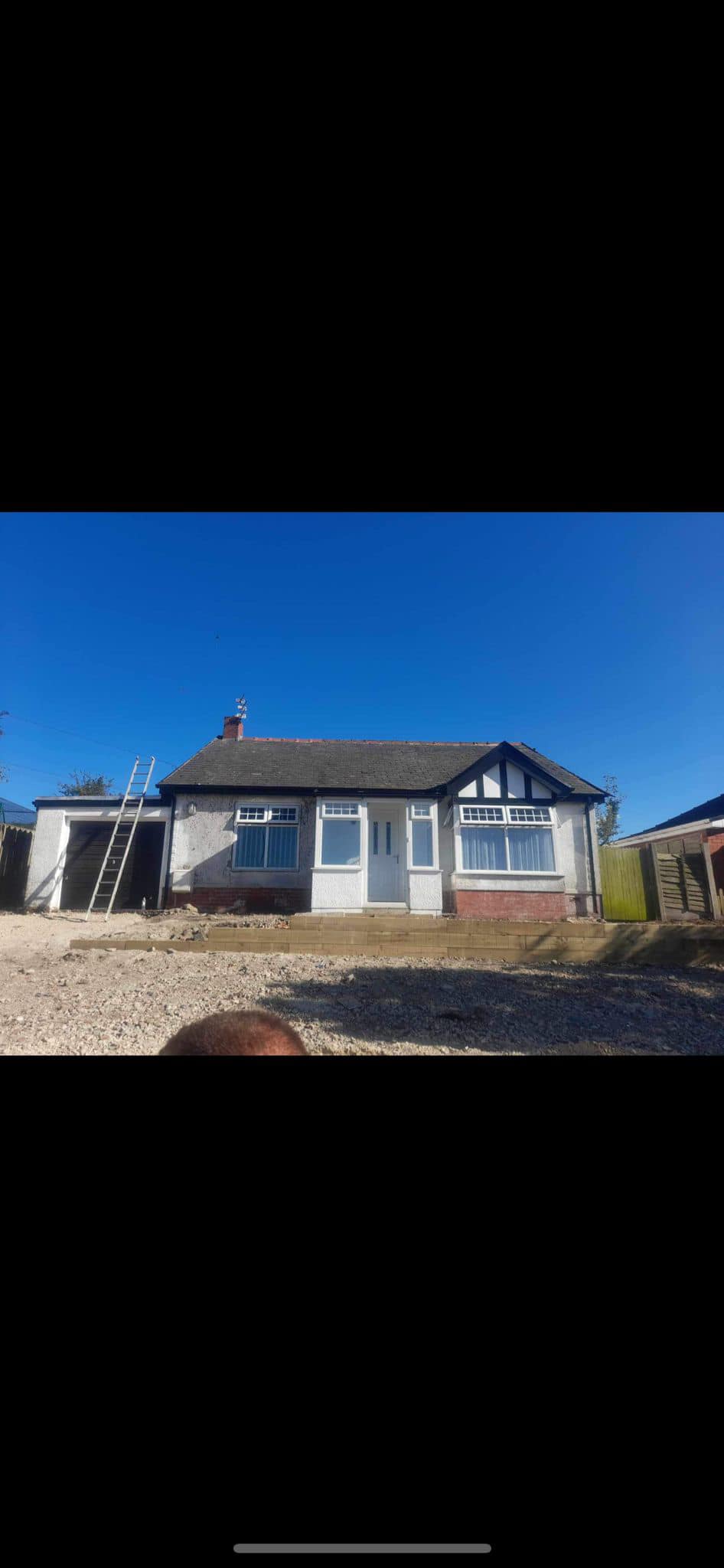 Professional roofers working on a property in London - KS Roof Master