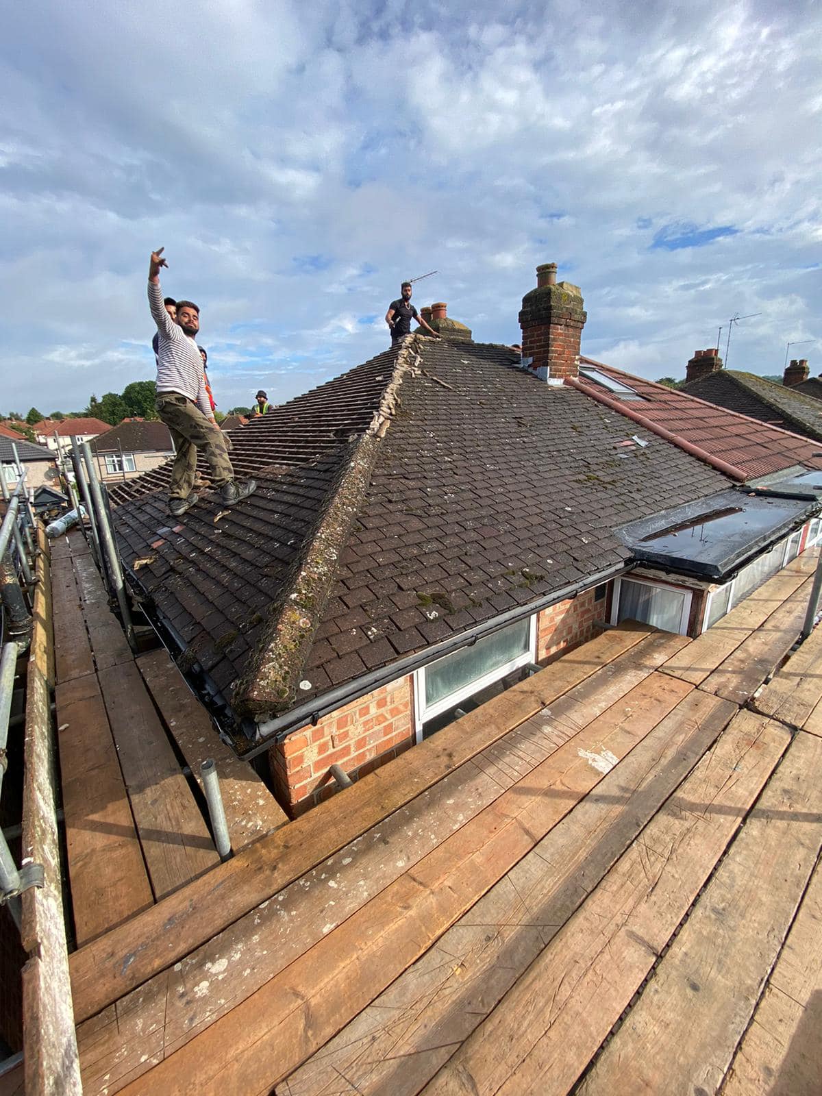 Professional roofers working on a property in London - KS Roof Master