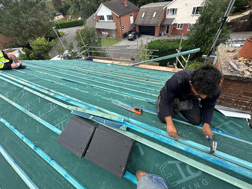 Professional roofers working on a property in London - KS Roof Master