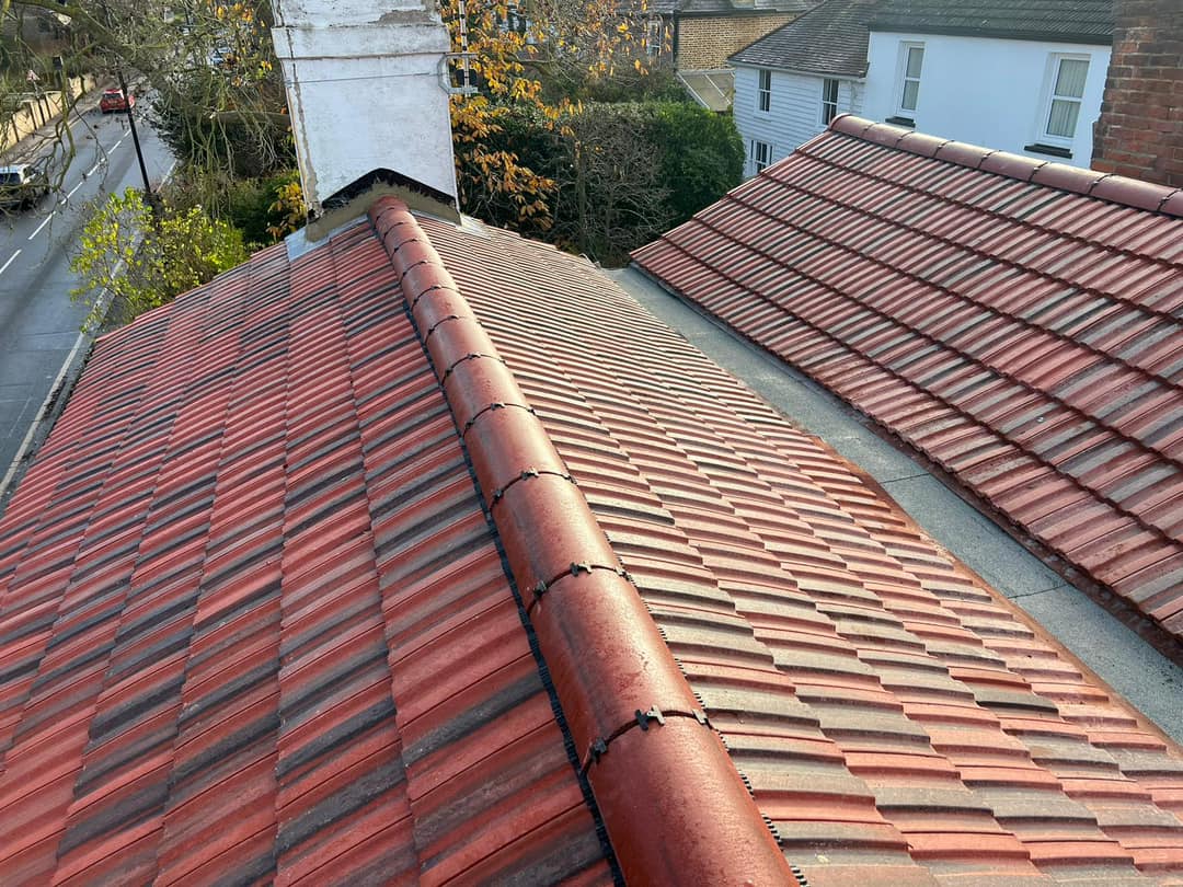 Professional roofers working on a property in London - KS Roof Master