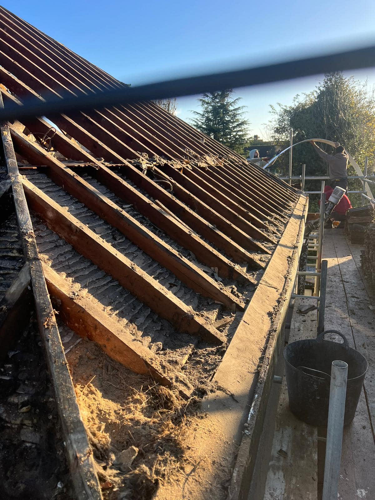 Professional roofers working on a property in London - KS Roof Master