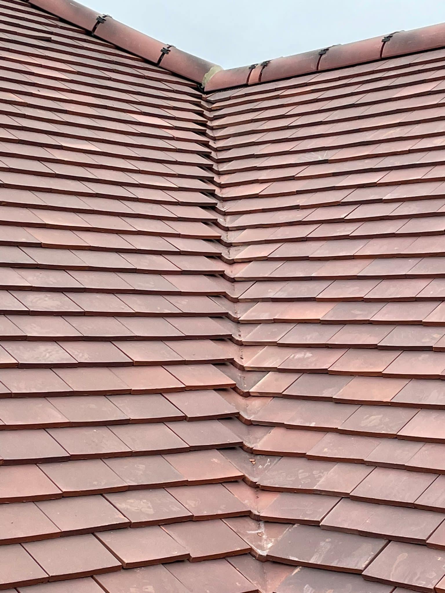 Professional roofers working on a property in London - KS Roof Master