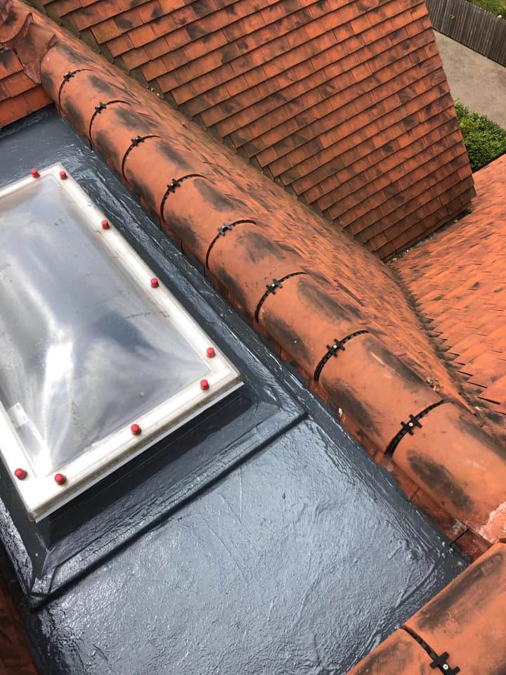 Professional roofers working on a property in London - KS Roof Master