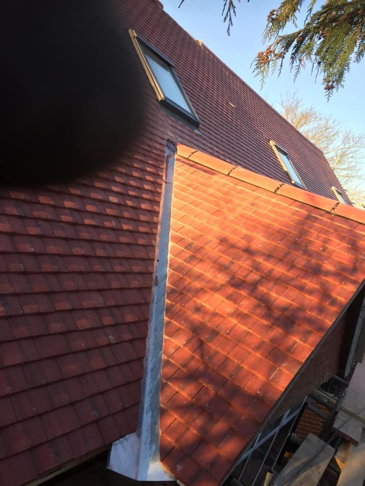 Professional roofers working on a property in London - KS Roof Master