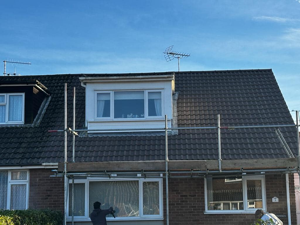 Professional roofers working on a property in London - KS Roof Master