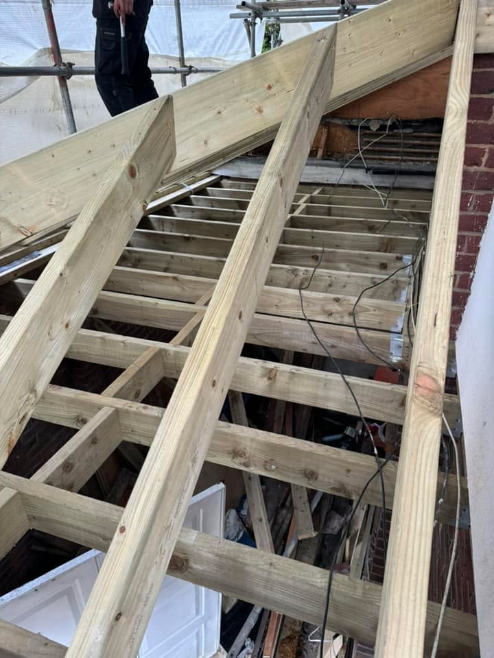 Professional roofers working on a property in London - KS Roof Master