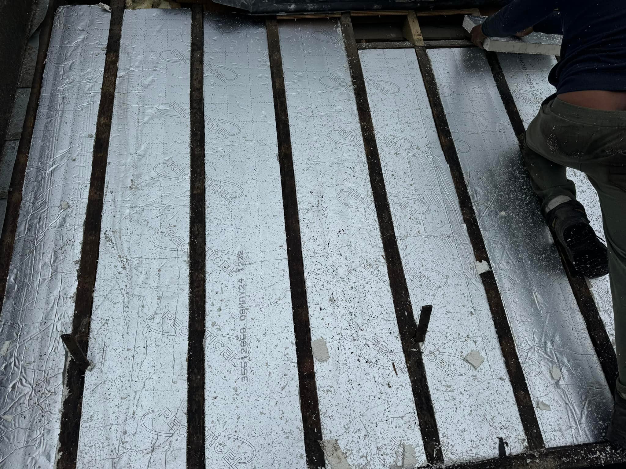 Professional roofers working on a property in London - KS Roof Master
