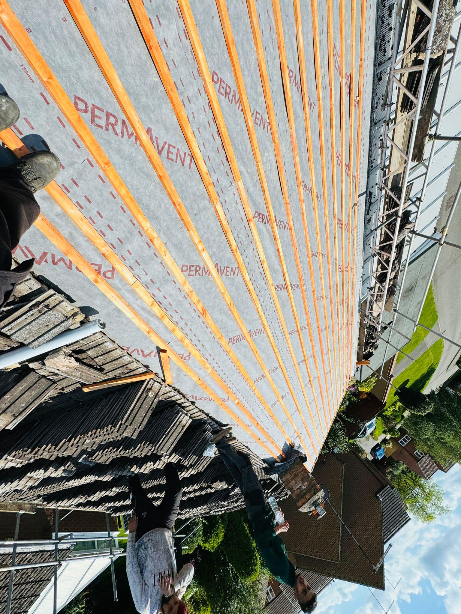 Professional roofers working on a property in London - KS Roof Master