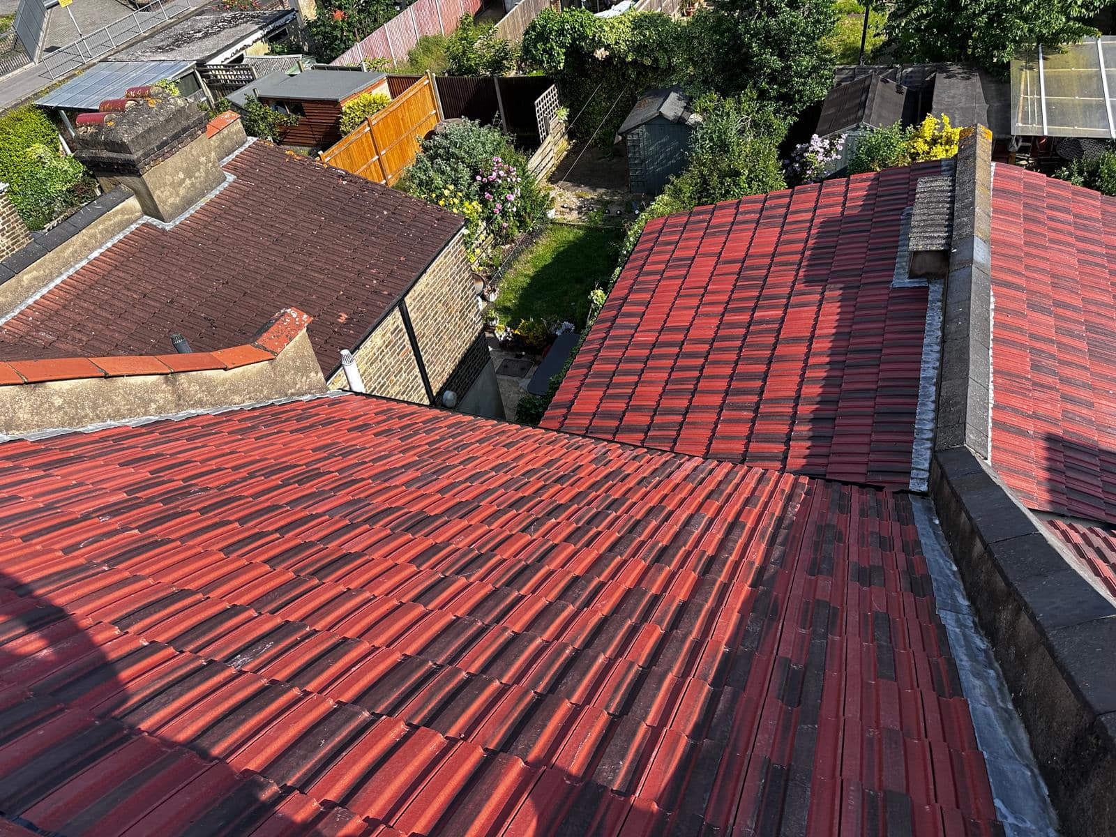 Professional roofers working on a property in London - KS Roof Master