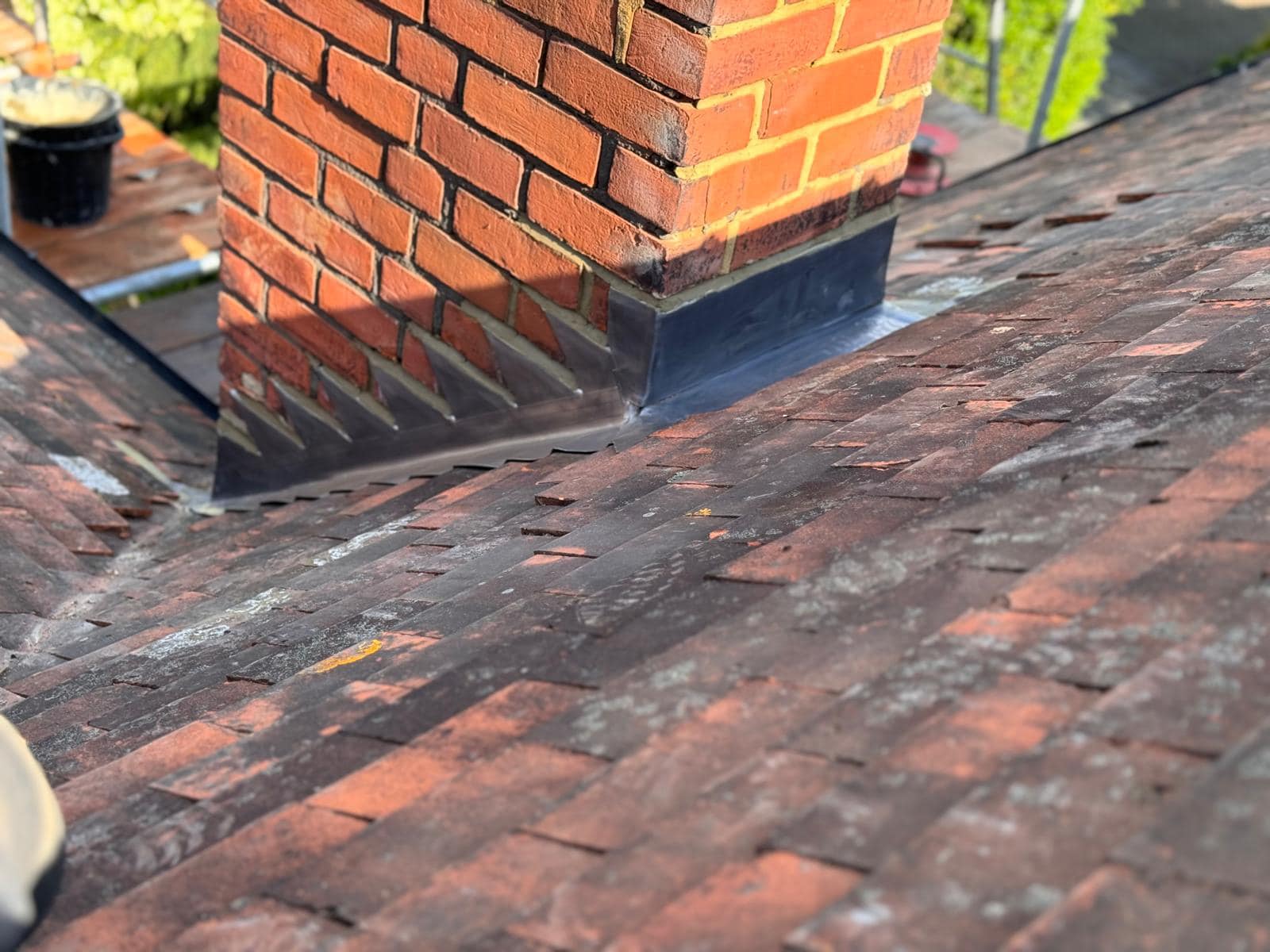 Professional roofers working on a property in London - KS Roof Master