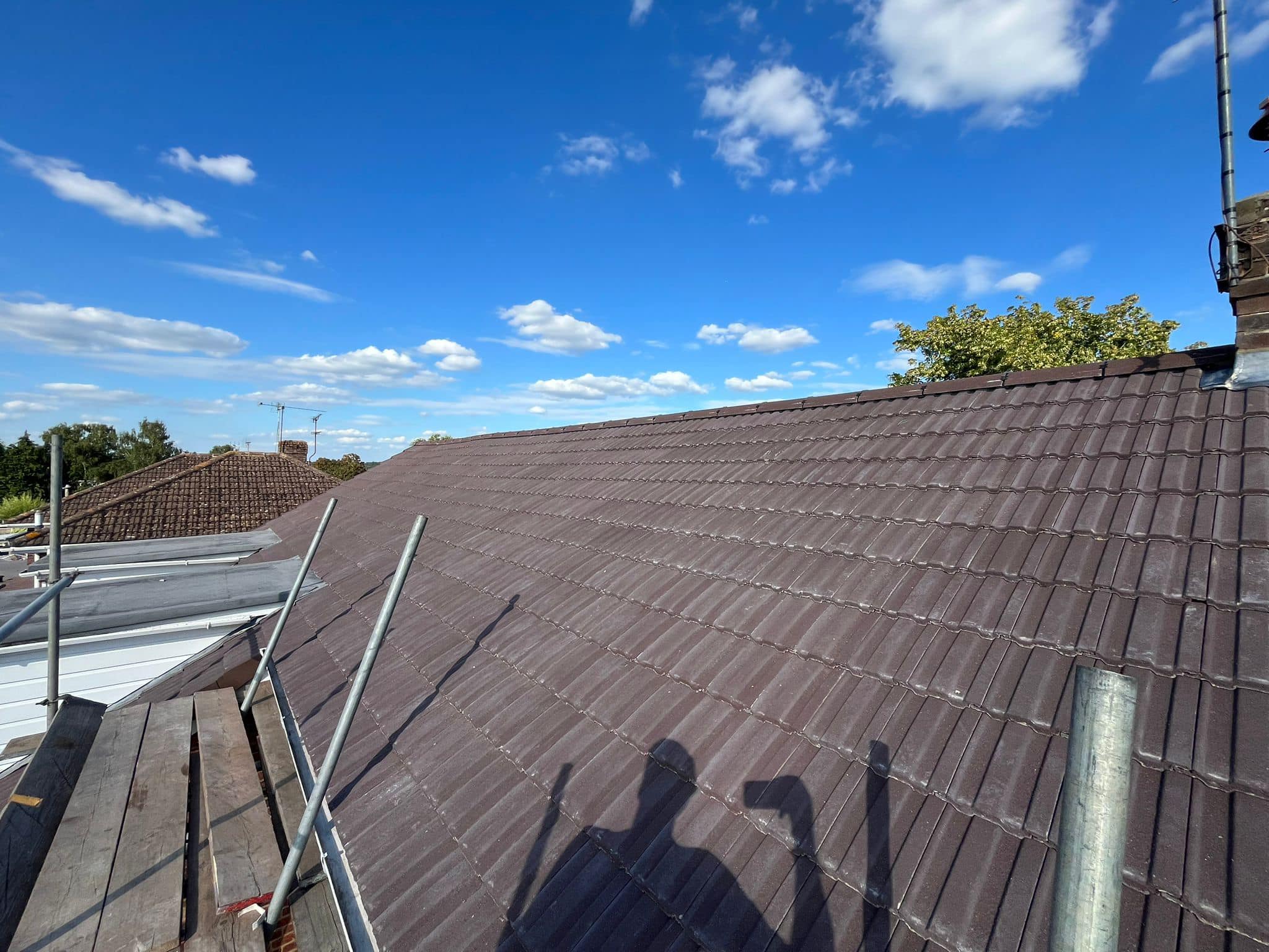 Professional roofers working on a property in London - KS Roof Master
