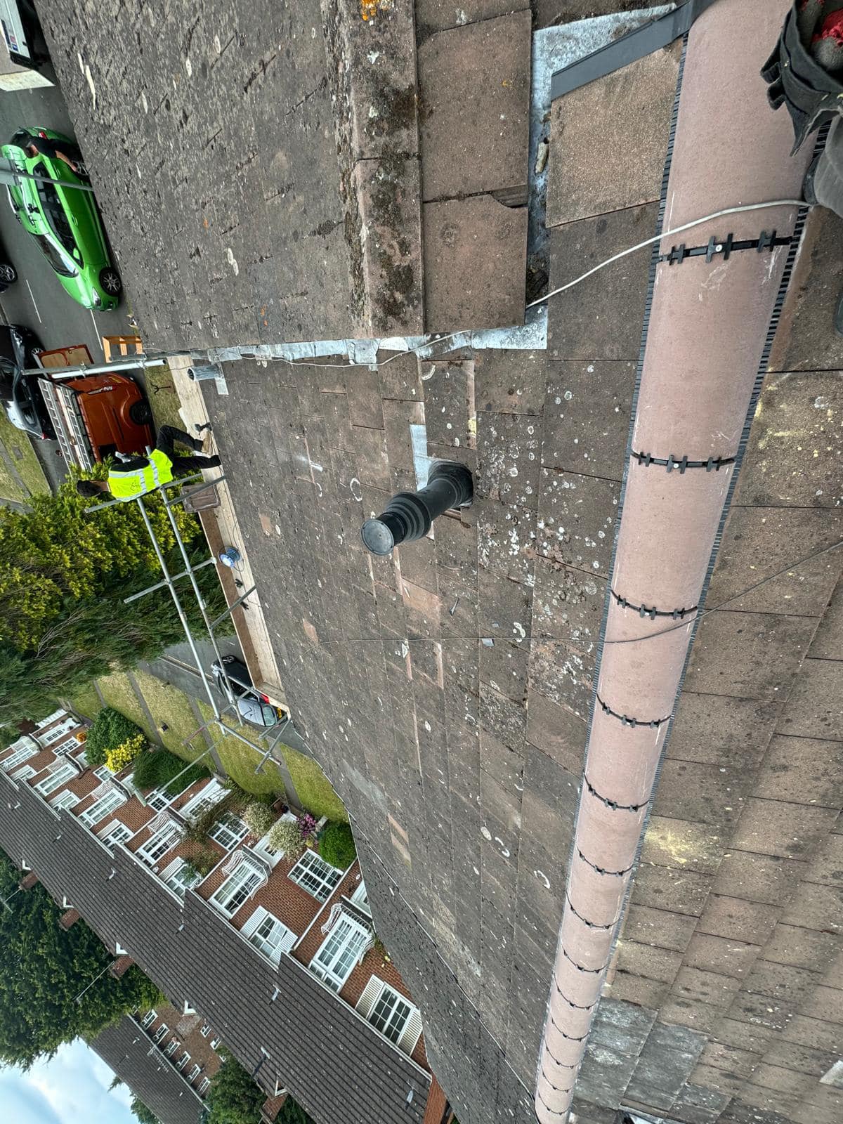 Professional roofers working on a property in London - KS Roof Master
