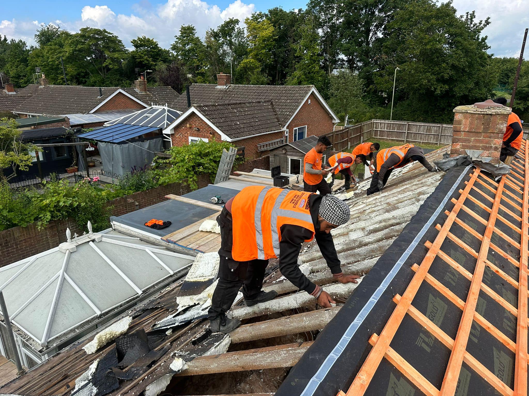 Professional roofers working on a property in London - KS Roof Master