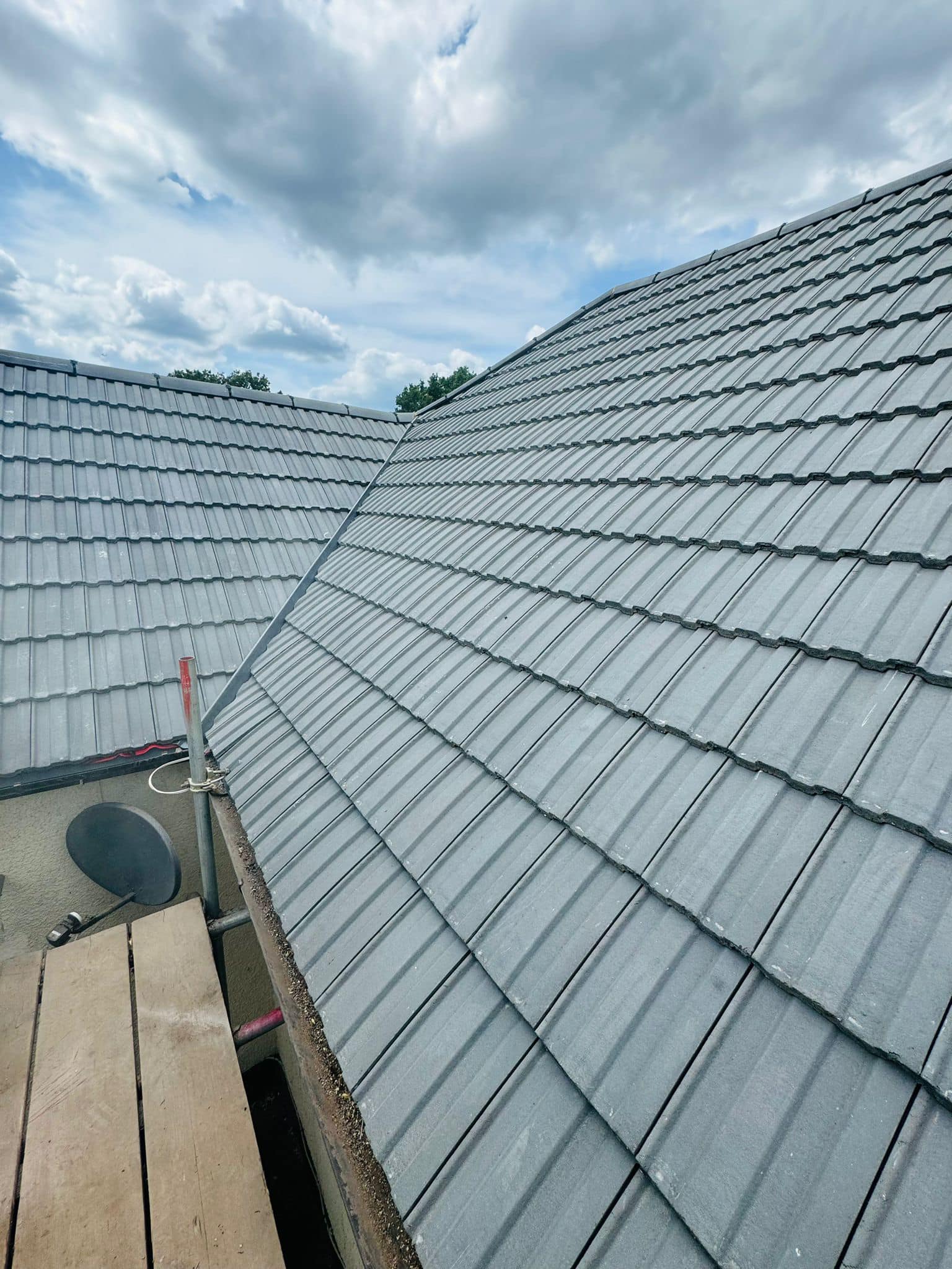 Professional roofers working on a property in London - KS Roof Master