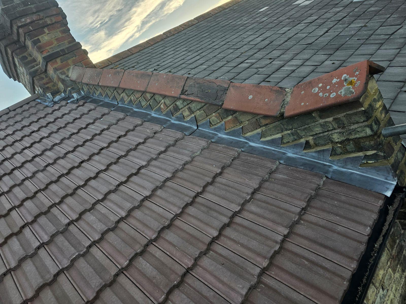 Professional roofers working on a property in London - KS Roof Master