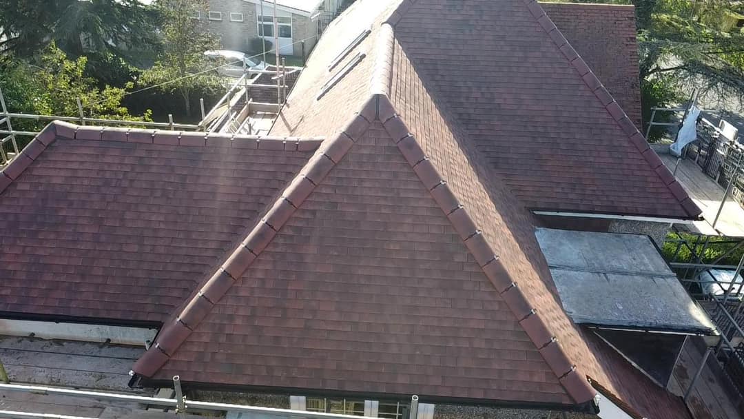 Professional roofers working on a property in London - KS Roof Master