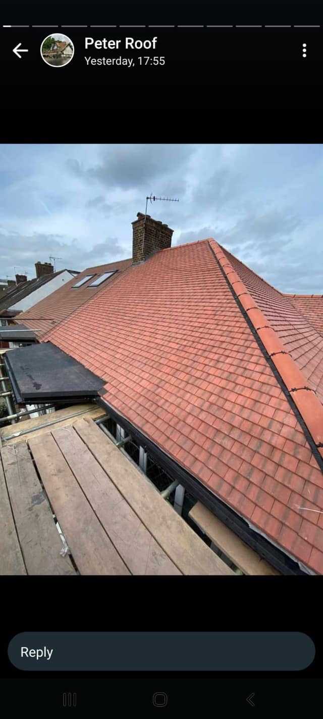 Professional roofers working on a property in London - KS Roof Master