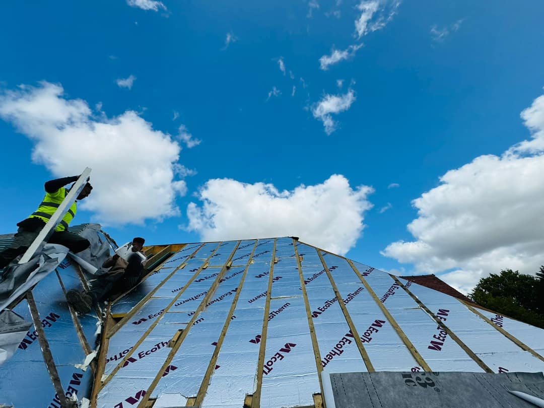 Professional roofers working on a property in London - KS Roof Master
