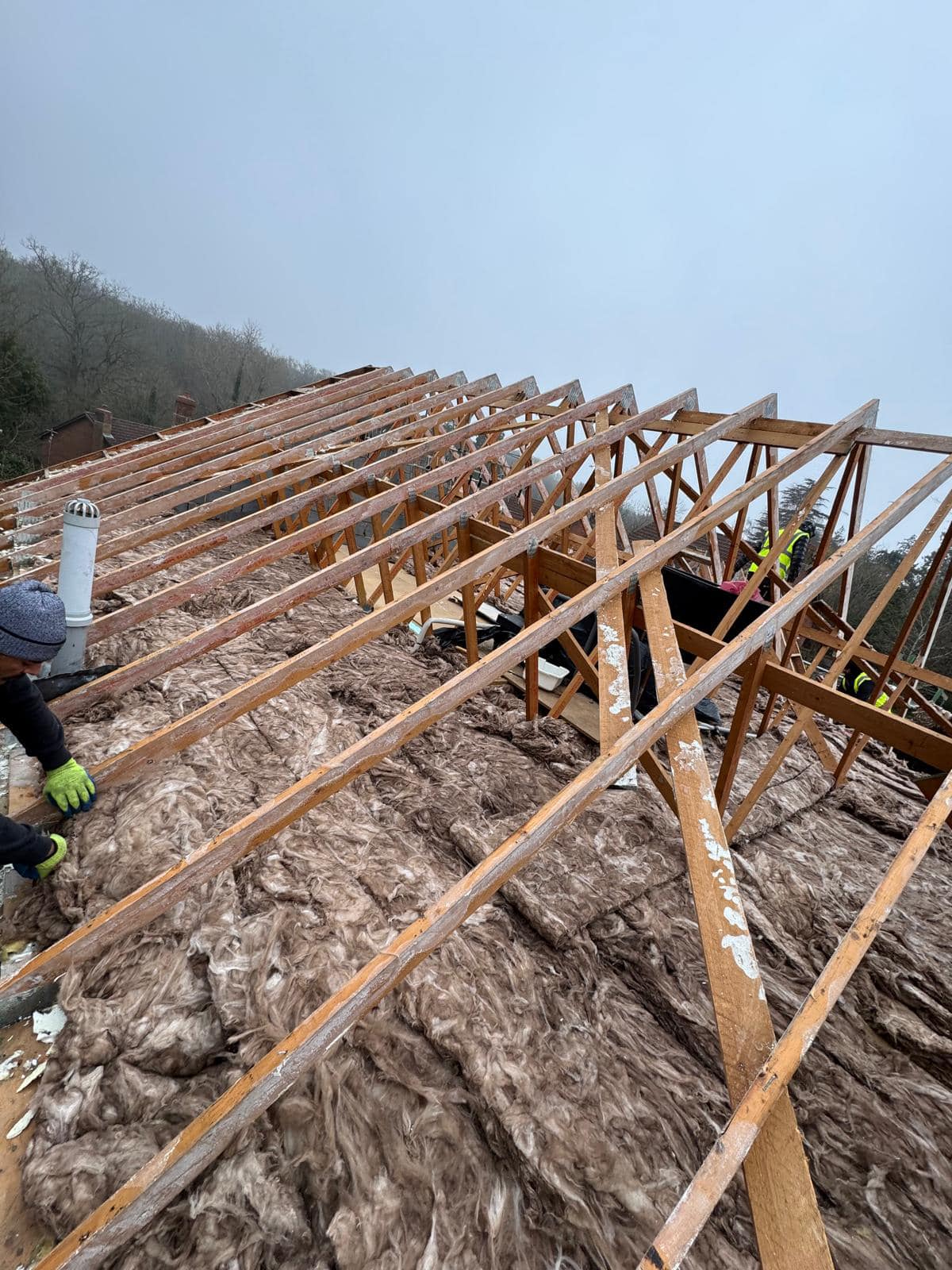 Professional roofers working on a property in London - KS Roof Master