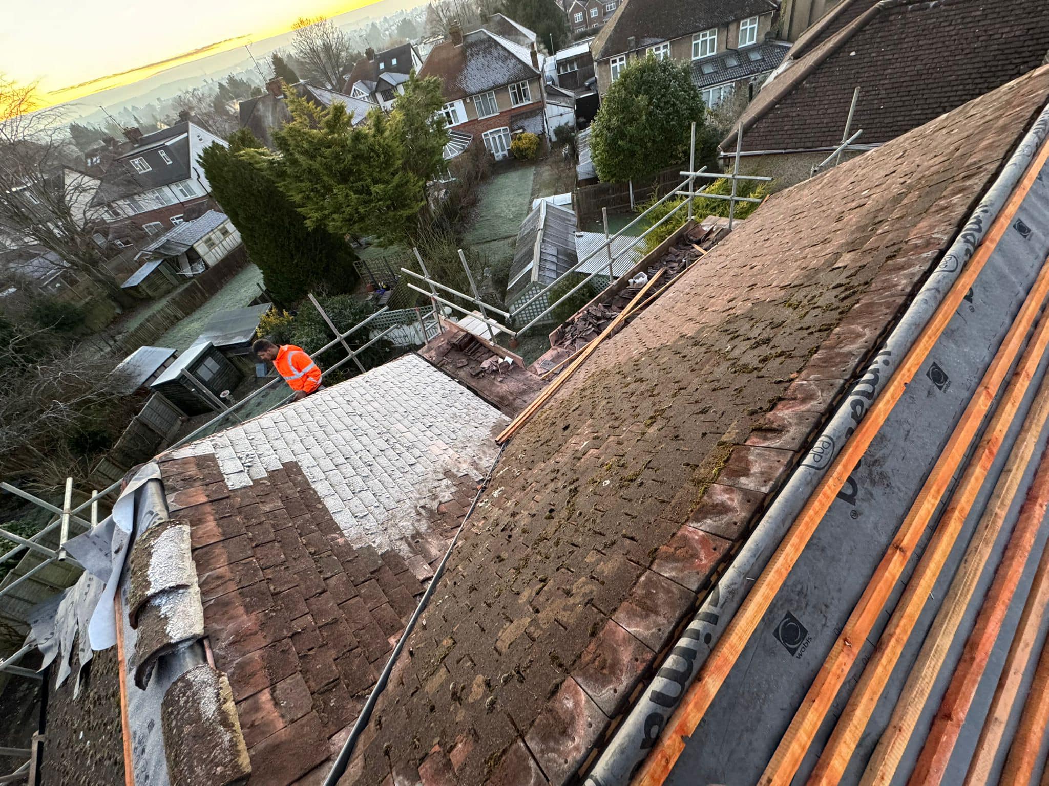 Professional roofers working on a property in London - KS Roof Master