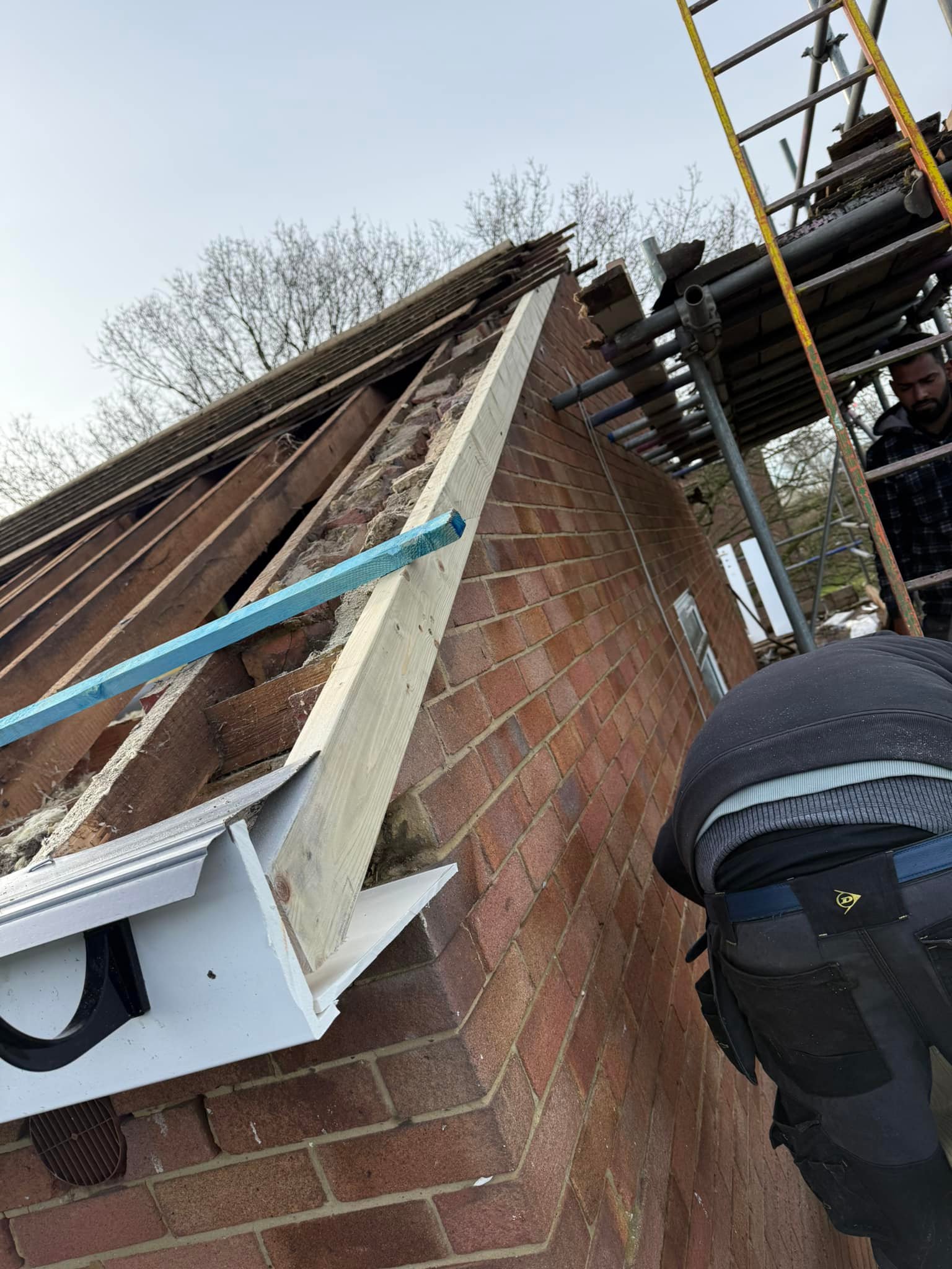 Professional roofers working on a property in London - KS Roof Master