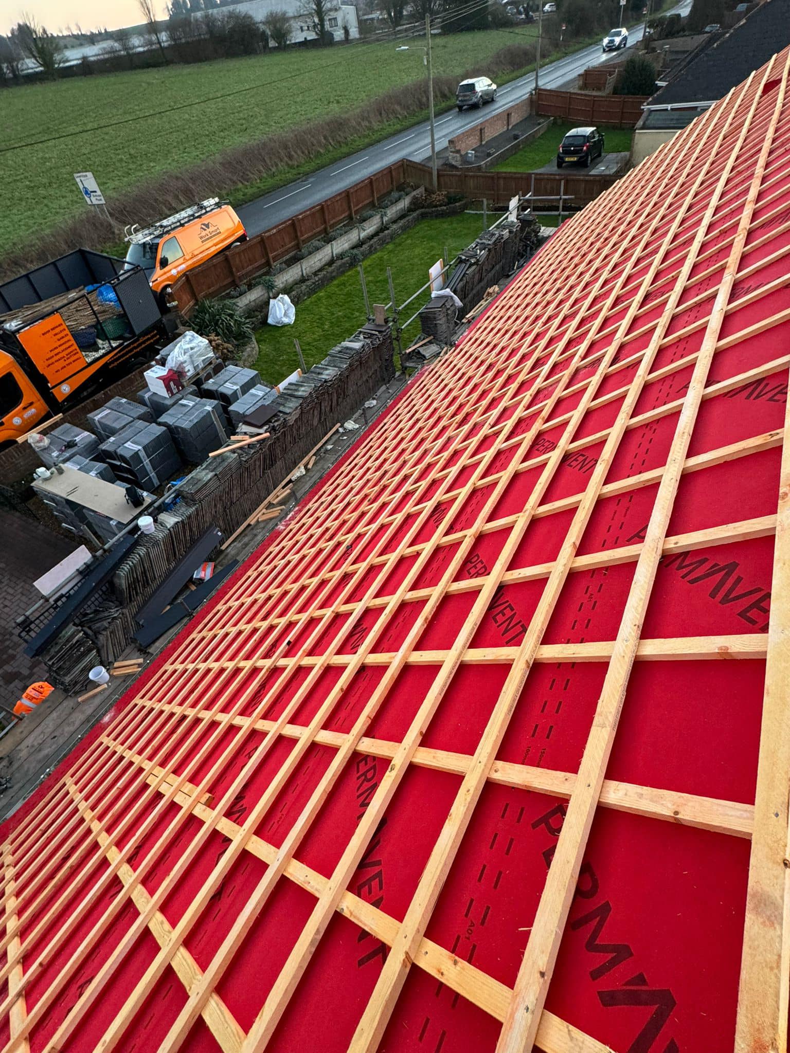 Professional roofers working on a property in London - KS Roof Master