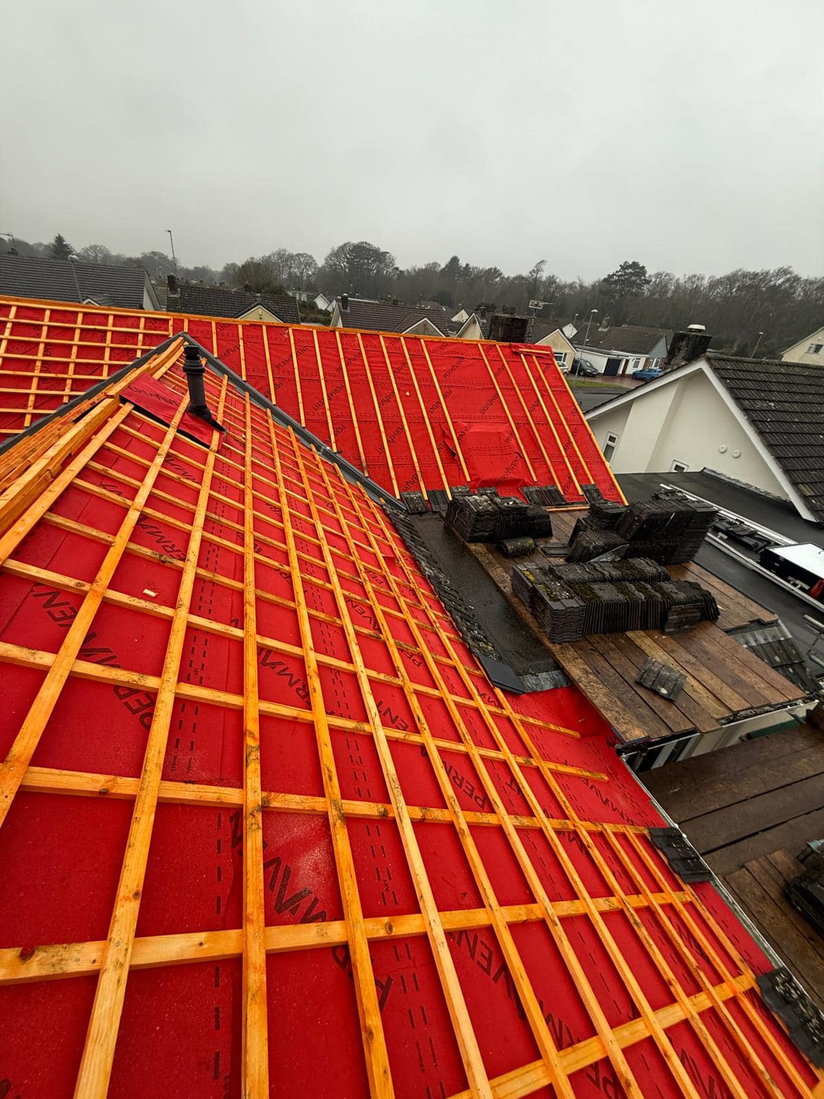 Professional roofers working on a property in London - KS Roof Master