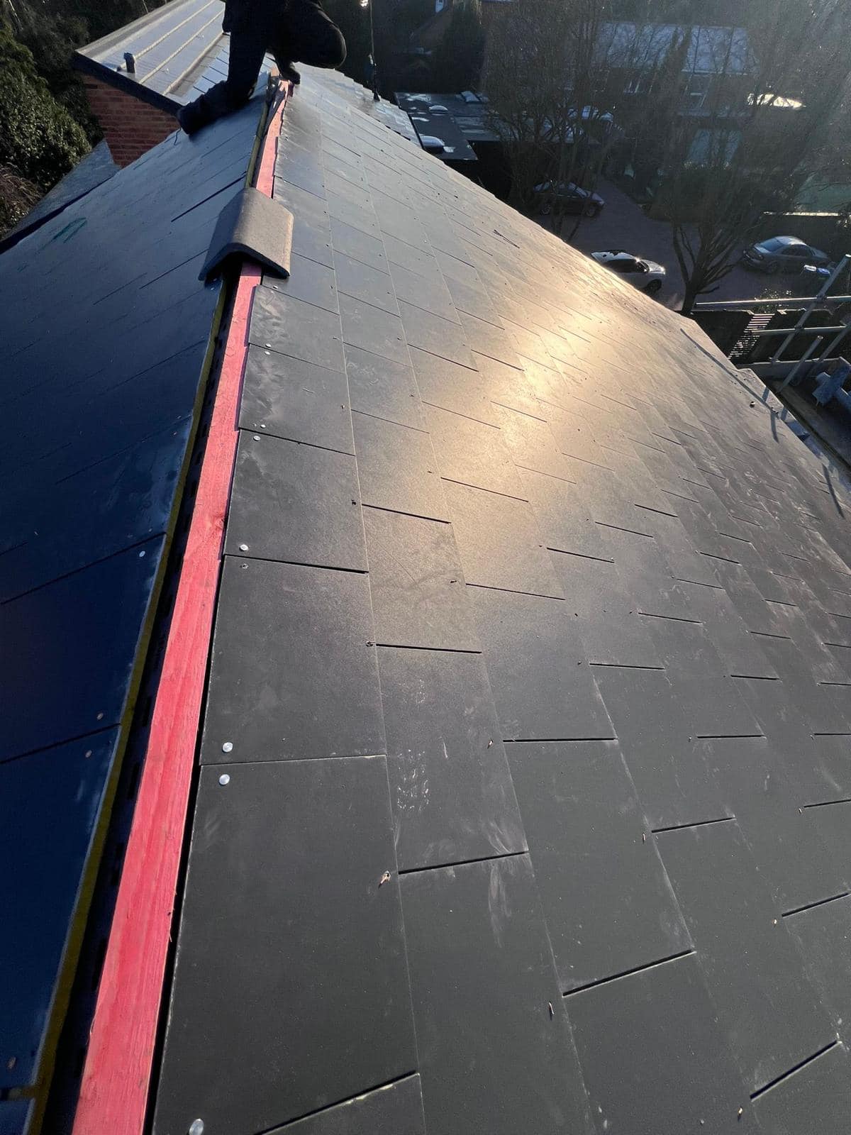 Professional roofers working on a property in London - KS Roof Master