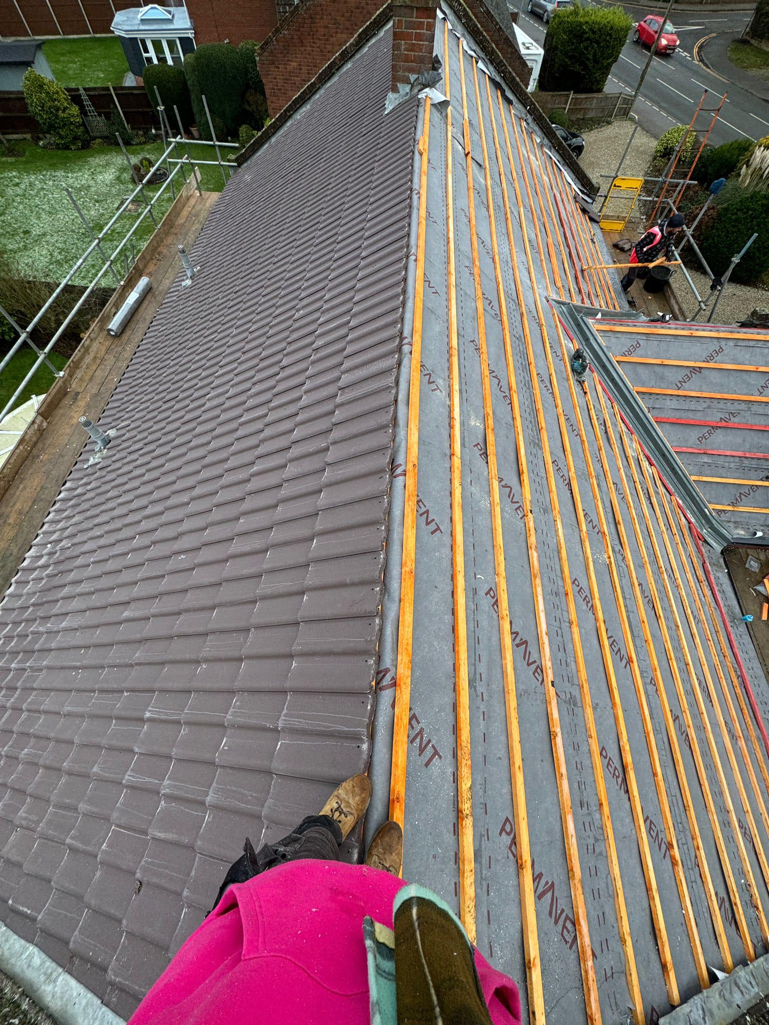 Professional roofers working on a property in London - KS Roof Master