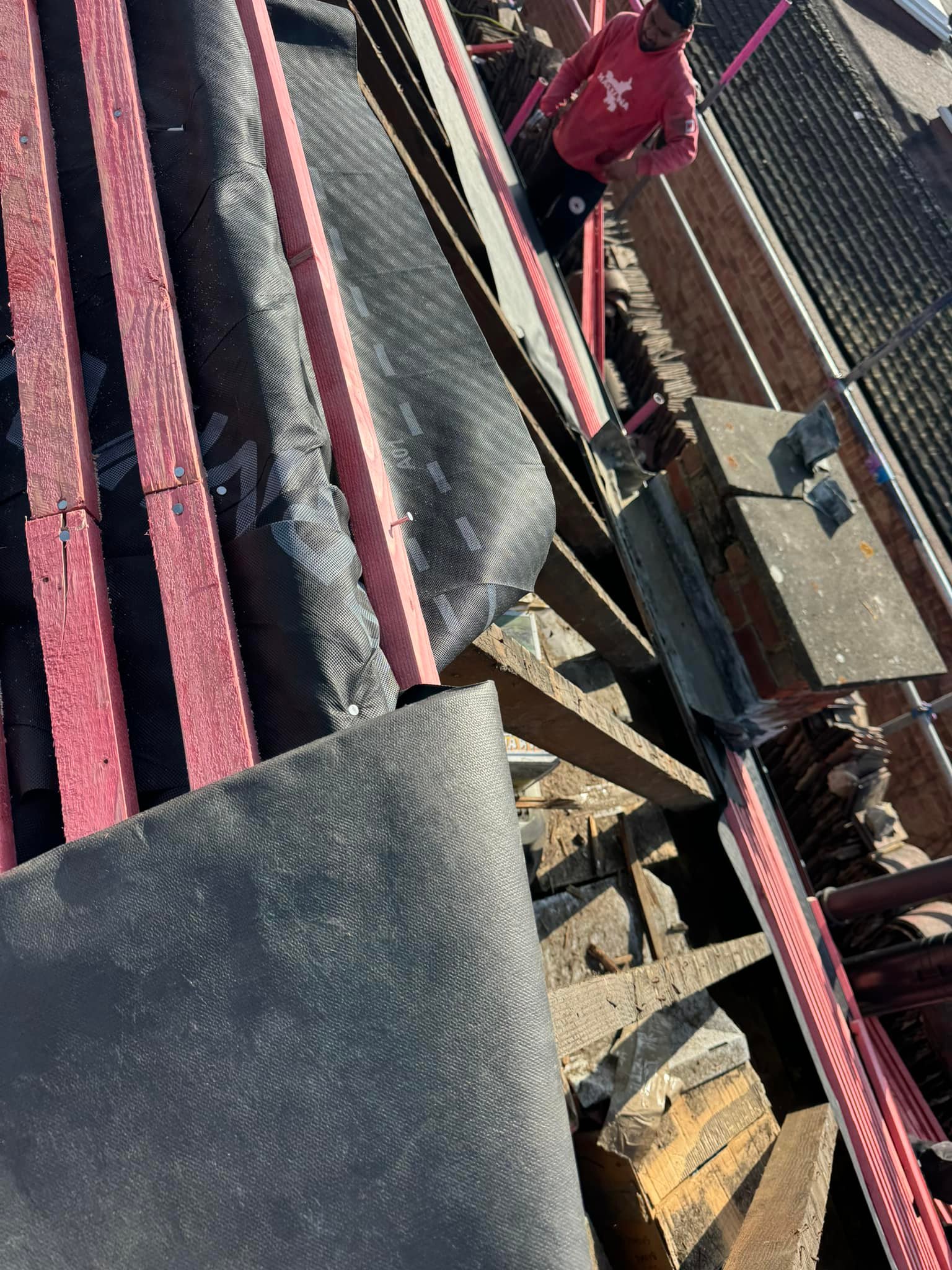 Professional roofers working on a property in London - KS Roof Master