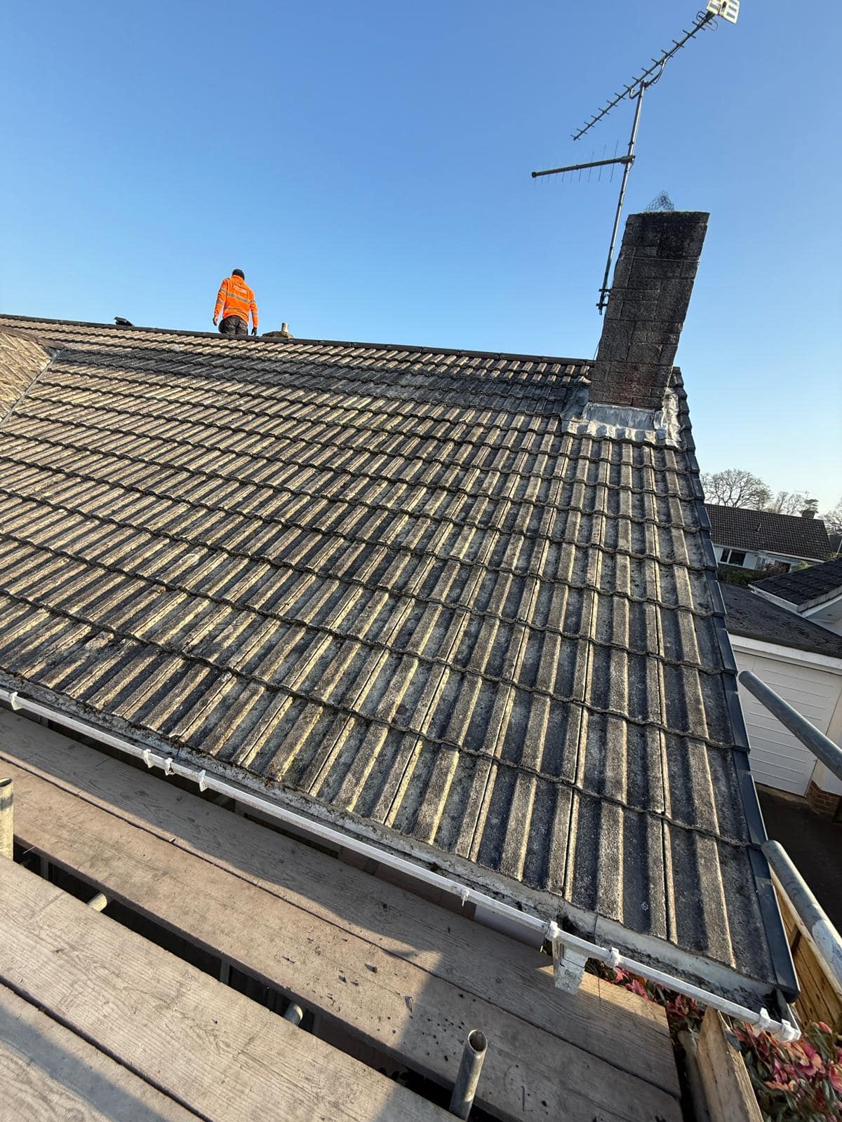 Professional roofers working on a property in London - KS Roof Master