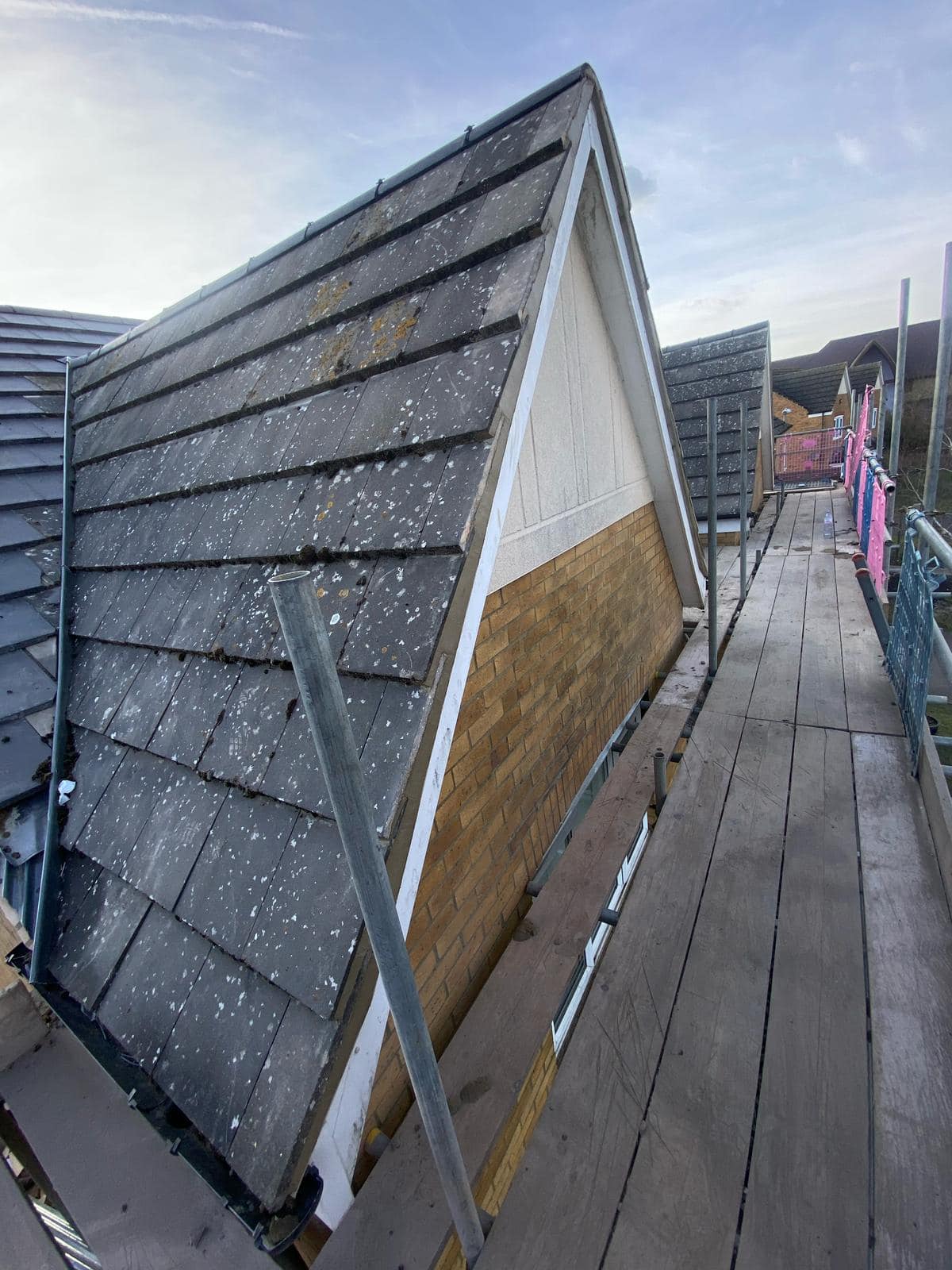 Professional roofers working on a property in London - KS Roof Master