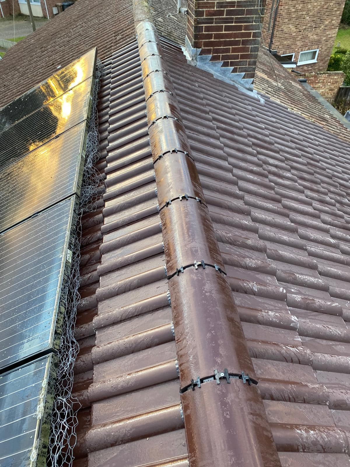 Professional roofers working on a property in London - KS Roof Master