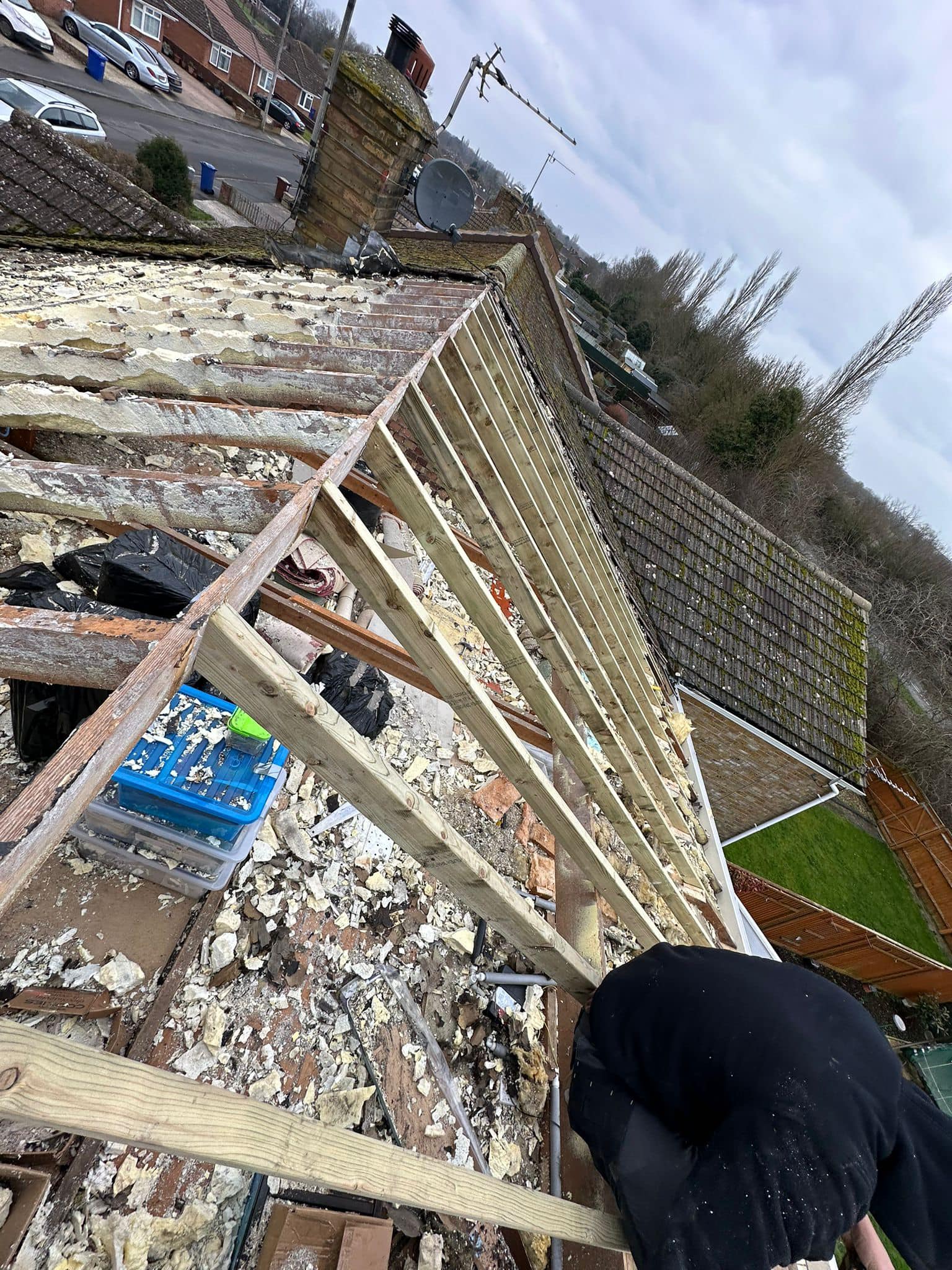 Professional roofers working on a property in London - KS Roof Master