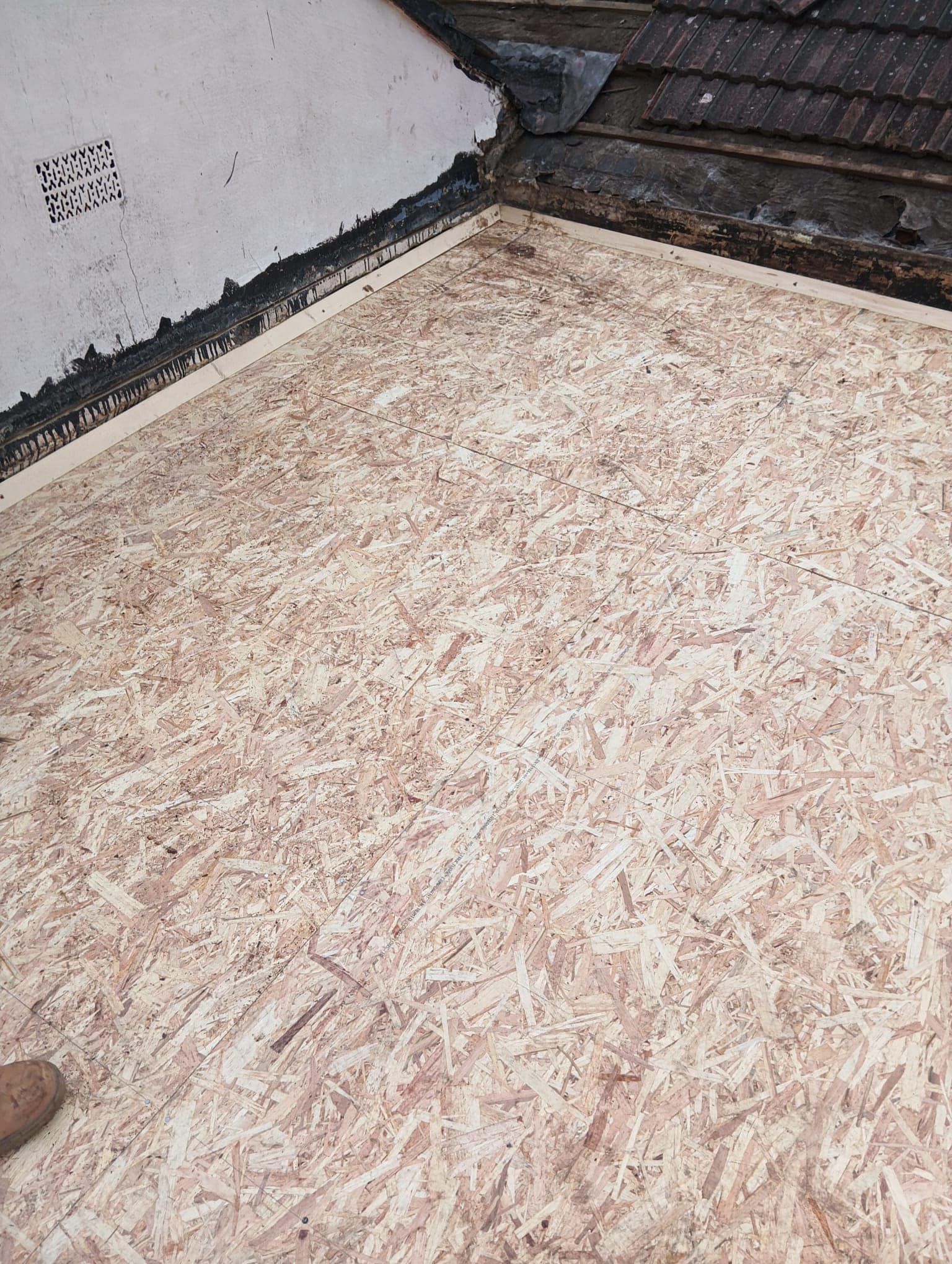 Professional roofers working on a property in London - KS Roof Master