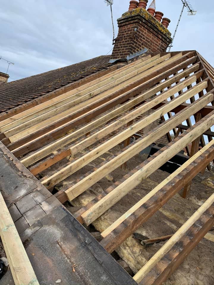 Professional roofers working on a property in London - KS Roof Master