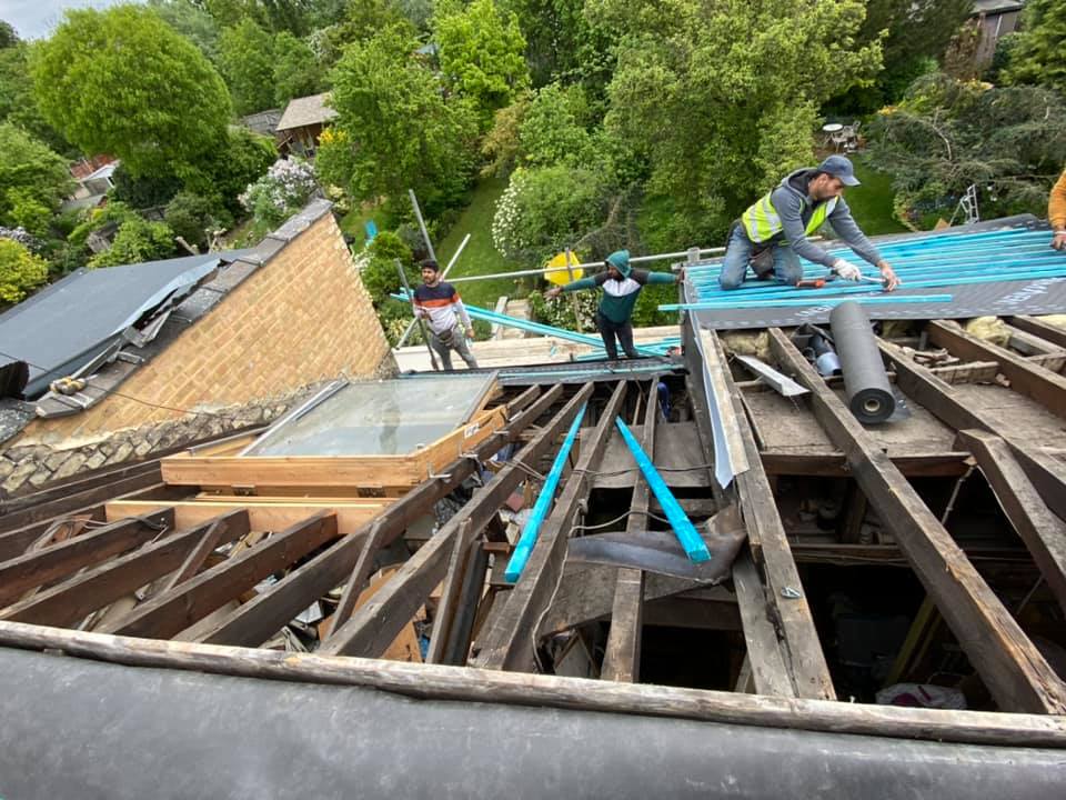 Professional roofers working on a property in London - KS Roof Master