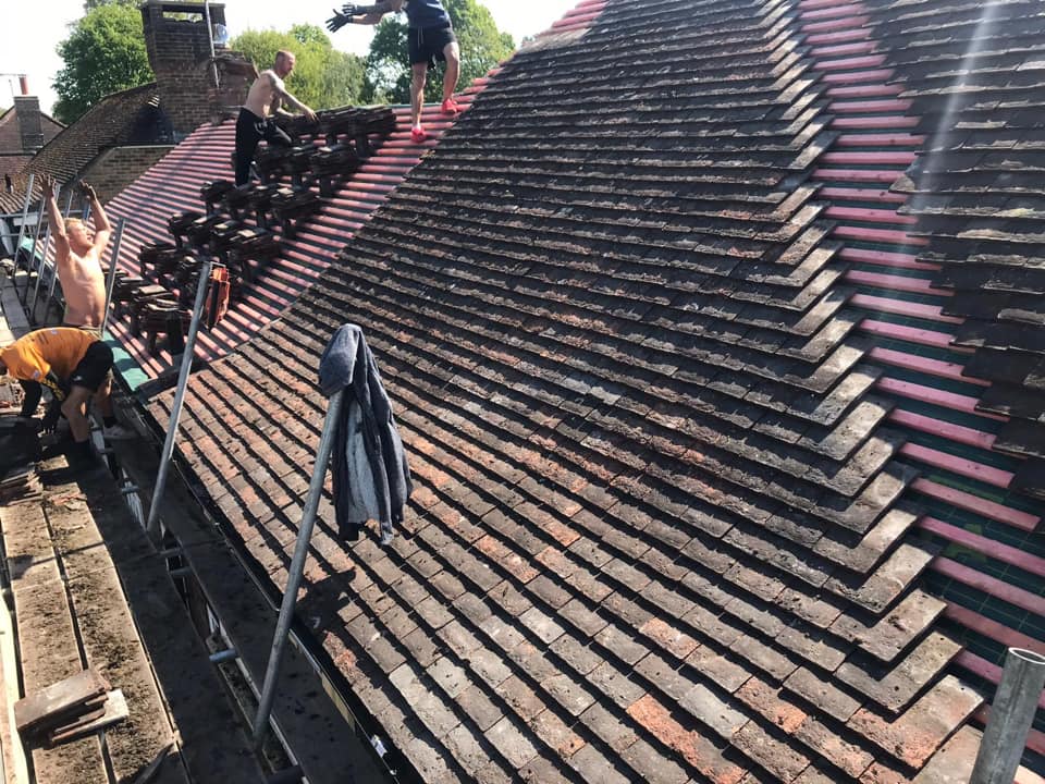 Professional roofers working on a property in London - KS Roof Master
