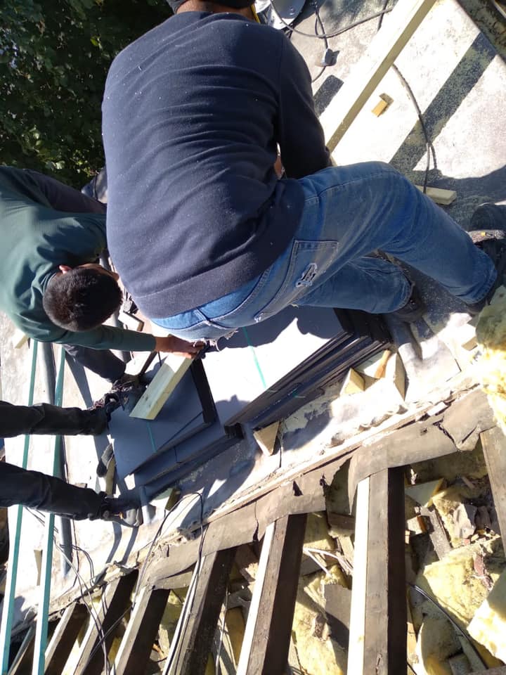 Professional roofers working on a property in London - KS Roof Master