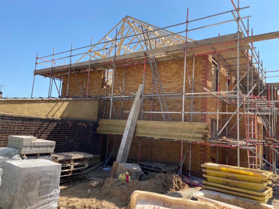 Professional roofers working on a property in London - KS Roof Master