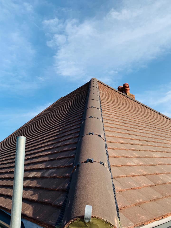 Professional roofers working on a property in London - KS Roof Master