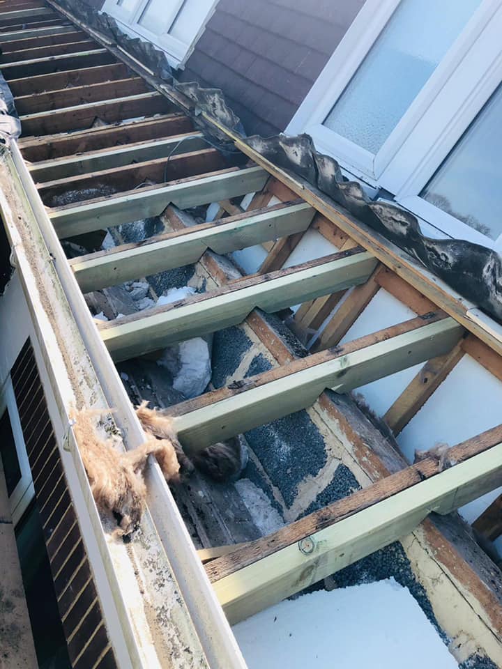 Professional roofers working on a property in London - KS Roof Master