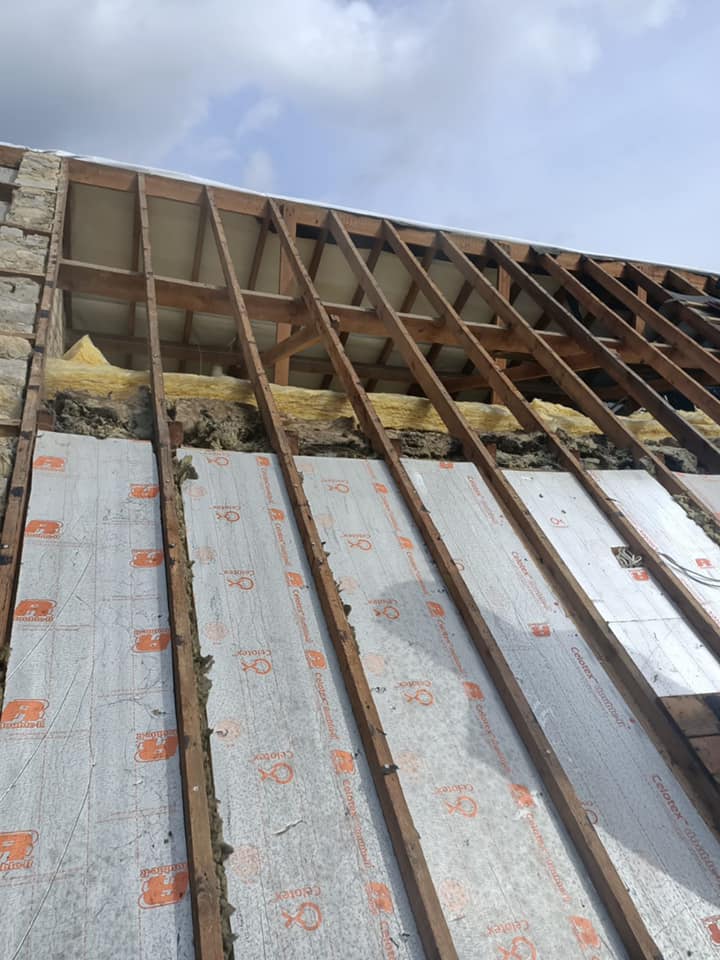 Professional roofers working on a property in London - KS Roof Master