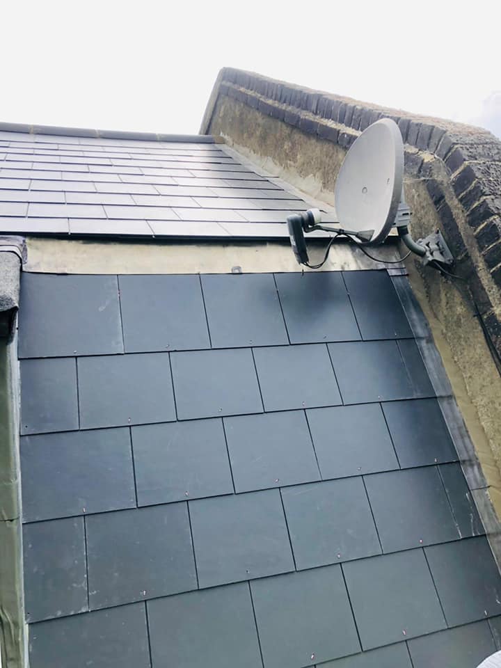 Professional roofers working on a property in London - KS Roof Master