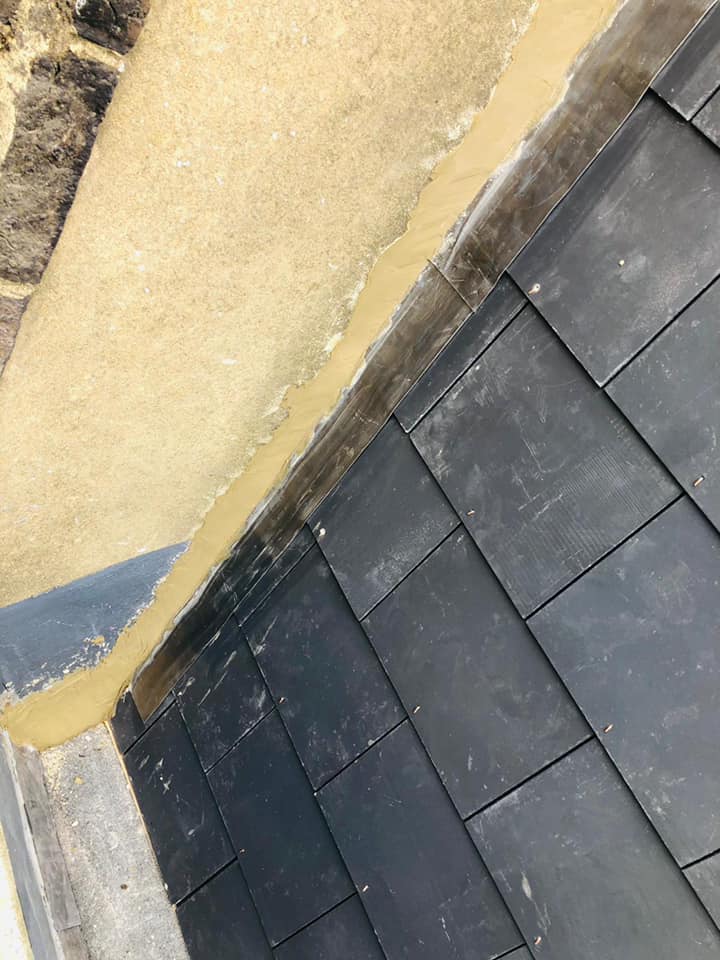 Professional roofers working on a property in London - KS Roof Master