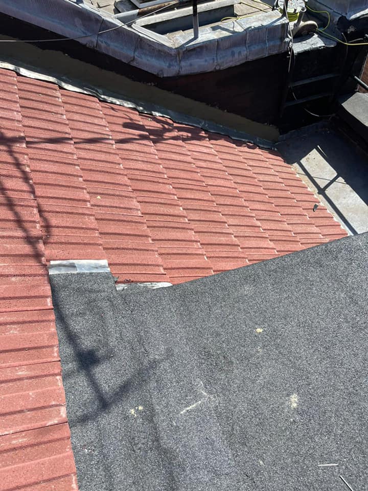 Professional roofers working on a property in London - KS Roof Master