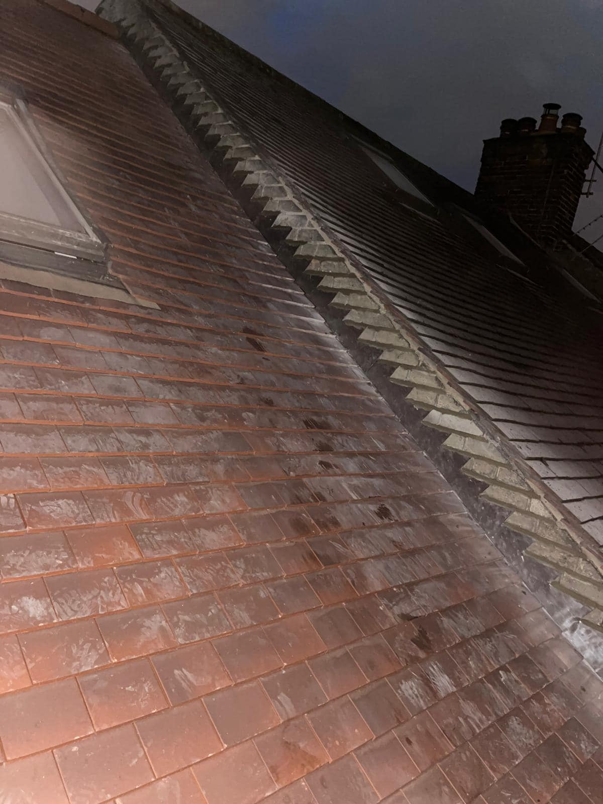 Professional roofers working on a property in London - KS Roof Master