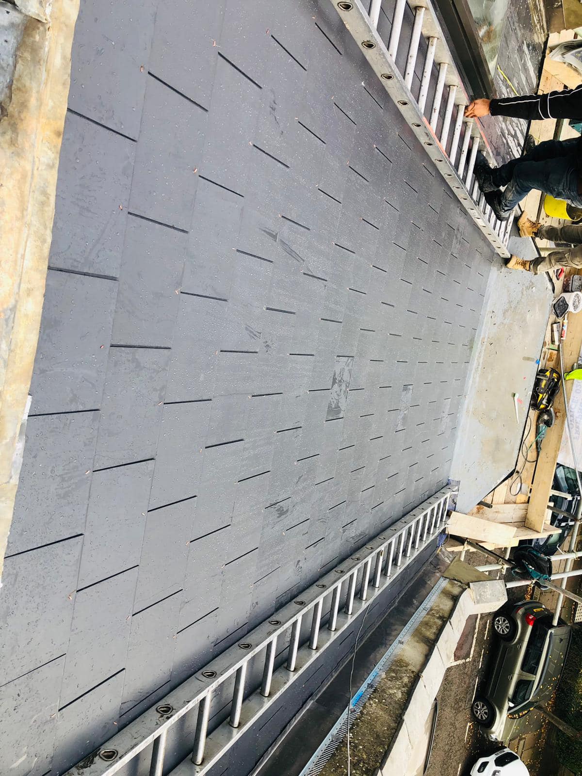 Professional roofers working on a property in London - KS Roof Master