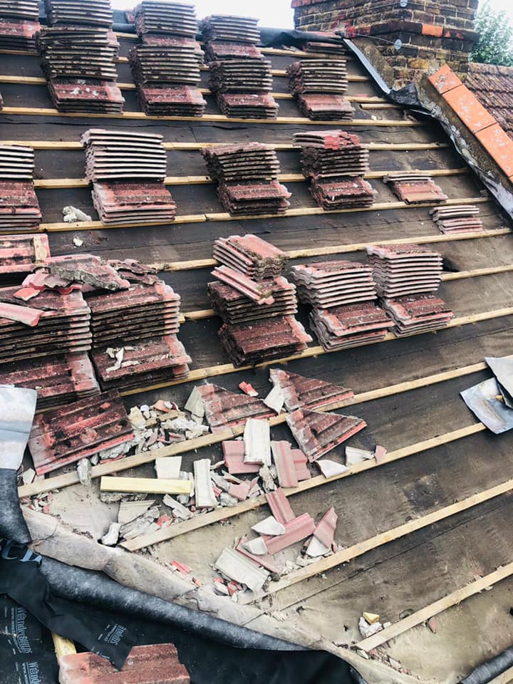 Professional roofers working on a property in London - KS Roof Master