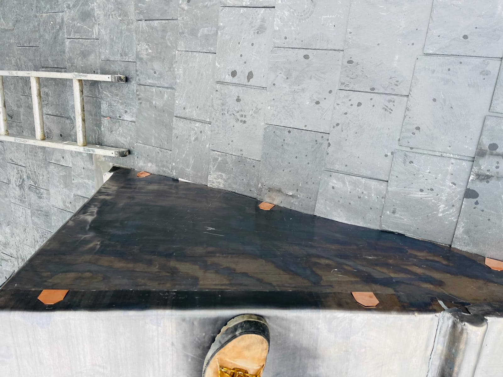 Professional roofers working on a property in London - KS Roof Master